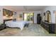Spacious main bedroom, king bed, and large windows at 3851 Wilshire Dr # 9, Sarasota, FL 34238