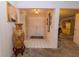 View of entryway, showing double doors and flooring at 3851 Wilshire Dr # 9, Sarasota, FL 34238