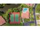 Community amenities including a pool and tennis courts at 3851 Wilshire Dr # 9, Sarasota, FL 34238