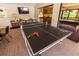 Game room with ping pong table and plenty of space at 3851 Wilshire Dr # 9, Sarasota, FL 34238