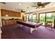 Community game room with a billiard table at 3851 Wilshire Dr # 9, Sarasota, FL 34238