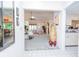 Spacious entryway with view of living room and kitchen at 3851 Wilshire Dr # 9, Sarasota, FL 34238