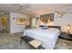 Spacious Primary bedroom with king-size bed and ample closet space at 3851 Wilshire Dr # 9, Sarasota, FL 34238