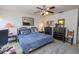 Bedroom with queen-size bed and ample storage at 3851 Wilshire Dr # 9, Sarasota, FL 34238
