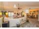 Open living room showcasing a comfortable seating area and access to dining area at 3851 Wilshire Dr # 9, Sarasota, FL 34238