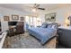 Guest bedroom with queen-size bed and workspace at 3851 Wilshire Dr # 9, Sarasota, FL 34238