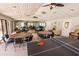 Community room with tables, chairs, and ping pong at 3851 Wilshire Dr # 9, Sarasota, FL 34238