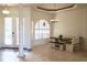 Bright dining area with built-in bench seating and a chandelier at 114 147Th Ne St, Bradenton, FL 34212