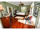 Spacious bedroom with hardwood floors and large window at 2107 89Th St Nw, Bradenton, FL 34209
