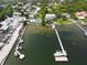 Aerial view showcasing waterfront property with private dock at 2107 89Th St Nw, Bradenton, FL 34209