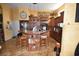 Spacious kitchen with an island, custom cabinetry, and granite countertops at 2107 89Th St Nw, Bradenton, FL 34209