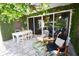 Relaxing patio with seating area and lush greenery at 2107 89Th St Nw, Bradenton, FL 34209