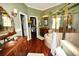 Elegant bathroom with soaking tub, walk-in shower, and hardwood floors at 2107 89Th St Nw, Bradenton, FL 34209