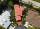 Aerial view showing house with red tile roof and private pool at 2107 89Th St Nw, Bradenton, FL 34209