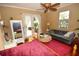 Bedroom with hardwood floors, French doors, and a private patio at 2107 89Th St Nw, Bradenton, FL 34209