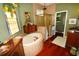 Spa-like bathroom featuring a large soaking tub and walk-in shower at 2107 89Th St Nw, Bradenton, FL 34209