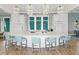 Modern community kitchen with a large island and seating at 6231 Dry Tortugas Dr, Sarasota, FL 34241