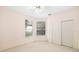 Well-lit bedroom with double door closet and ceiling fan at 7335 Saint Georges Way, University Park, FL 34201