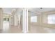 Open living area with tile floors and neutral tones at 7335 Saint Georges Way, University Park, FL 34201