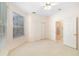 Bedroom with ensuite bathroom and ceiling fan at 7335 Saint Georges Way, University Park, FL 34201