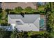 Overhead view of single-Gathering home with pool and driveway at 7335 Saint Georges Way, University Park, FL 34201