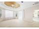 Large bedroom with plush carpeting and access to the bathroom at 7335 Saint Georges Way, University Park, FL 34201