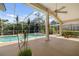 Inviting screened-in pool with spacious patio area at 7335 Saint Georges Way, University Park, FL 34201