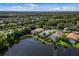 Exclusive neighborhood featuring lakefront homes with screened lanais at 7335 Saint Georges Way, University Park, FL 34201
