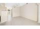 Bright living room with tile floors and access to the foyer at 7335 Saint Georges Way, University Park, FL 34201