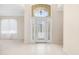 Bright and airy entryway with tile flooring and high ceilings at 7335 Saint Georges Way, University Park, FL 34201