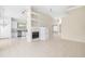 Open concept kitchen and living area with tile floors and breakfast nook at 7335 Saint Georges Way, University Park, FL 34201