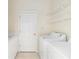 Laundry room with washer, dryer, and ample shelving at 7335 Saint Georges Way, University Park, FL 34201
