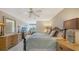 Spacious bedroom with king bed and dresser, offering tranquil views at 826 Bayport Way # 826, Longboat Key, FL 34228