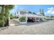 Modern building with covered parking and stairs at 826 Bayport Way # 826, Longboat Key, FL 34228