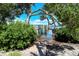 Scenic wooden pier leading to the water at 826 Bayport Way # 826, Longboat Key, FL 34228