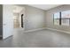 Bright bedroom features tile floors, a window for natural light and neutral paint at 109 Corserra Dr, Nokomis, FL 34275