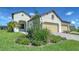 Charming single-Gathering home with a two-car garage, green lawn and fresh landscaping at 109 Corserra Dr, Nokomis, FL 34275