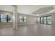 Spacious living room features tile floors, recessed lighting, and sliding glass doors to the outdoor area at 109 Corserra Dr, Nokomis, FL 34275