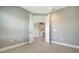 Room with light grey walls, baseboards, and a light colored ceramic tile at 109 Corserra Dr, Nokomis, FL 34275