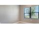 Window with view of lawn, trees and blinds at 109 Corserra Dr, Nokomis, FL 34275