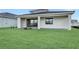 Home with covered patio and spacious backyard at 12926 Pinnacle Ln, Venice, FL 34293