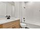 Clean bathroom with single vanity and bathtub at 12926 Pinnacle Ln, Venice, FL 34293