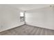 Bright bedroom featuring neutral wall colors and carpet flooring at 12926 Pinnacle Ln, Venice, FL 34293