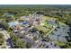 Community tennis courts, pool, and clubhouse at 13791 Palmetto Point Ct, Port Charlotte, FL 33953