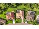 Three homes in a community with a golf course nearby at 13791 Palmetto Point Ct, Port Charlotte, FL 33953