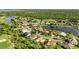 Bird's-eye view of a luxury waterfront community at 13791 Palmetto Point Ct, Port Charlotte, FL 33953