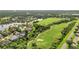 Aerial view of community near golf course at 13791 Palmetto Point Ct, Port Charlotte, FL 33953