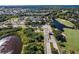 Gated community entrance with golf course view at 13791 Palmetto Point Ct, Port Charlotte, FL 33953