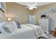 Comfortable guest bedroom with a charming and classic aesthetic at 13791 Palmetto Point Ct, Port Charlotte, FL 33953