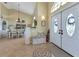 Spacious entry featuring a decorative tile floor and double doors at 13791 Palmetto Point Ct, Port Charlotte, FL 33953